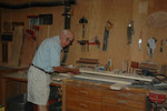 Phil Conlon constructs a base for the detector in his wood shop.