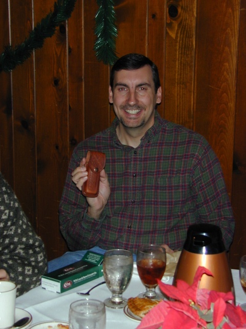Keith Schmitter received a pocket knife with wooden handle and logo which was awarded for 15 years of service.