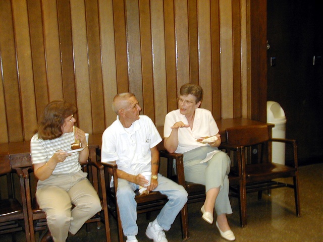 Yes, it's true.  Only two more hours and
we'll be out of here! (Warren & Virginia
with their neighbor lady seated to the
left of Warren.)