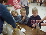 Experimenting with electricity and magnetism.
