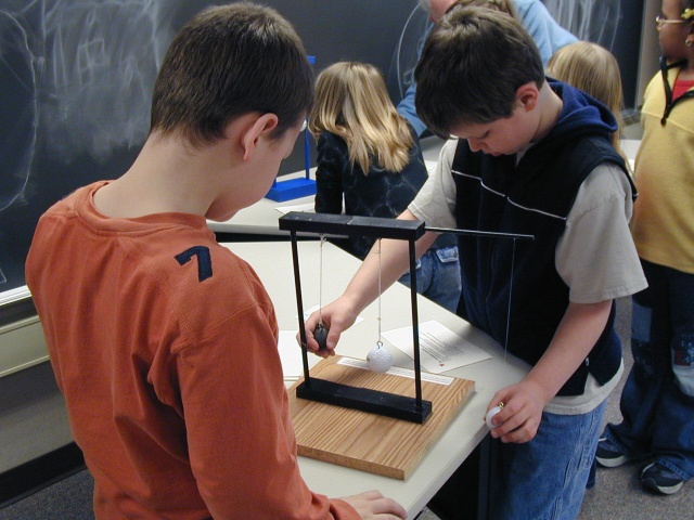 Pendulums: differing masses.