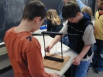 Pendulums: differing masses.