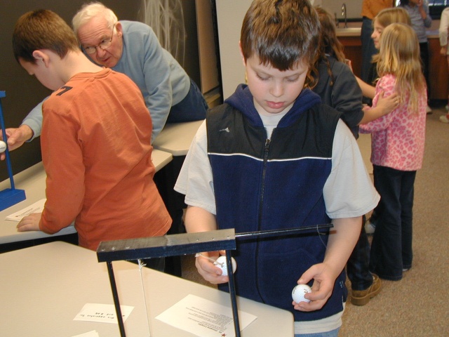 Pendulums: differing lengths.