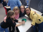 Enjoying a day of hands-on physics.