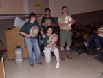 Team Bug gives last respects to their bug: the physicists are testing a new bug zapper.  The bug survives!