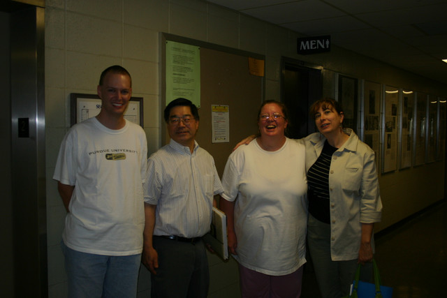 Now that the gang's here, the party
can get started!!  (Hey guys, the 
party's in Room 242, not the hallway...)