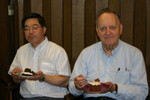 Slow down, Ed... there's plenty of
time for eating cake now that you're
retired...