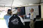 Clark Gedney, Biology Department, exchanges in College of Science Tent