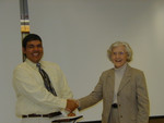 Betty Harmless presented to Chetan Sood - Clarion Systems Industrial Fellow 