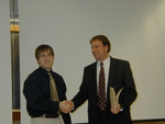 John Moore of Raytheon Technical Services presented to Seth McConchie - Raytheon Industrial Fellow