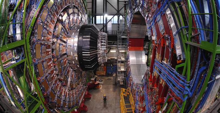 Huge Machinery, Tiny Particle