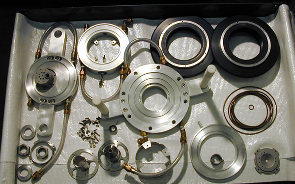 Parts of PRIME Lab's old 8-sample ion source.