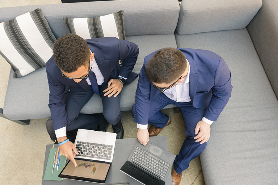 Students using laptops for discussion