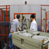 Tom Miller, Ken Mueller, and Pankaj Sharma installing the new injector magnet.