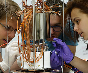 Undergraduate and graduate students working on a LBECA R&D detector.