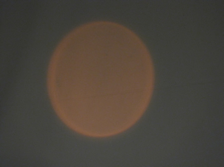 Orangish oval representing the sun.