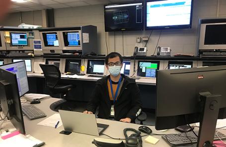 Yicheng Feng, PhD student of Purdue Physics and Astronomy, works in the Solenoid Tracker at RHIC (STAR) Control Room as part of his ongoing research.