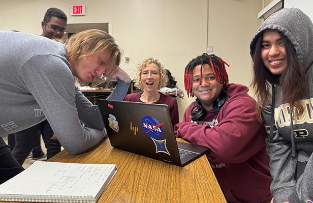 Students and Prof. Carlson who worked with a quantum computer