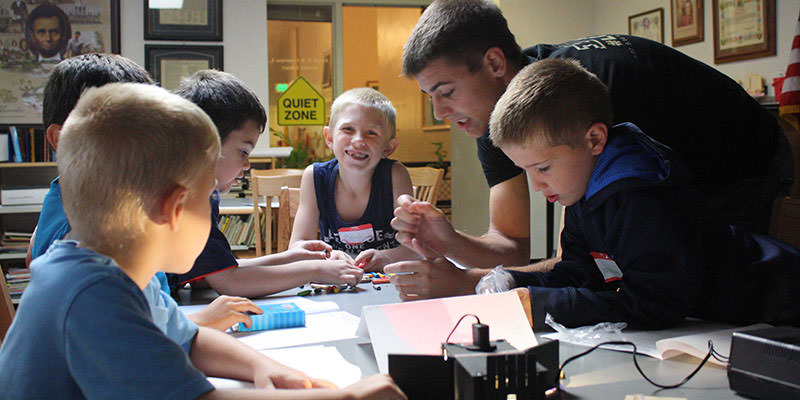 Students mixing and separating colors of light