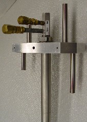 Actuator driven, sample changer rod
