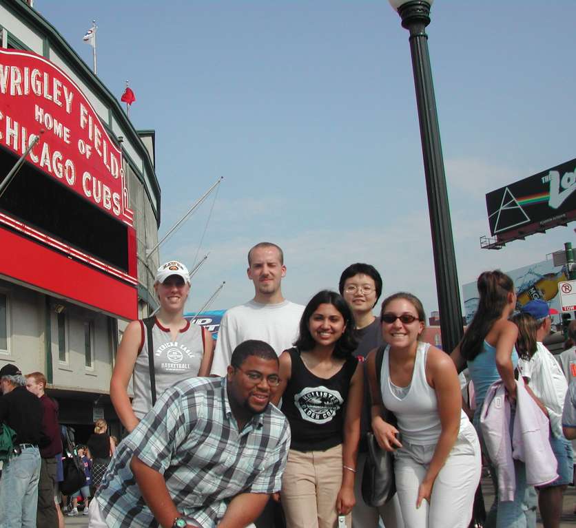 REU students posing in front of Wrigley Stadium.