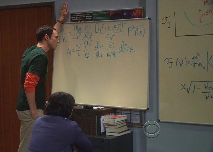 Sheldon from Big Bang Theory with a whiteboard.